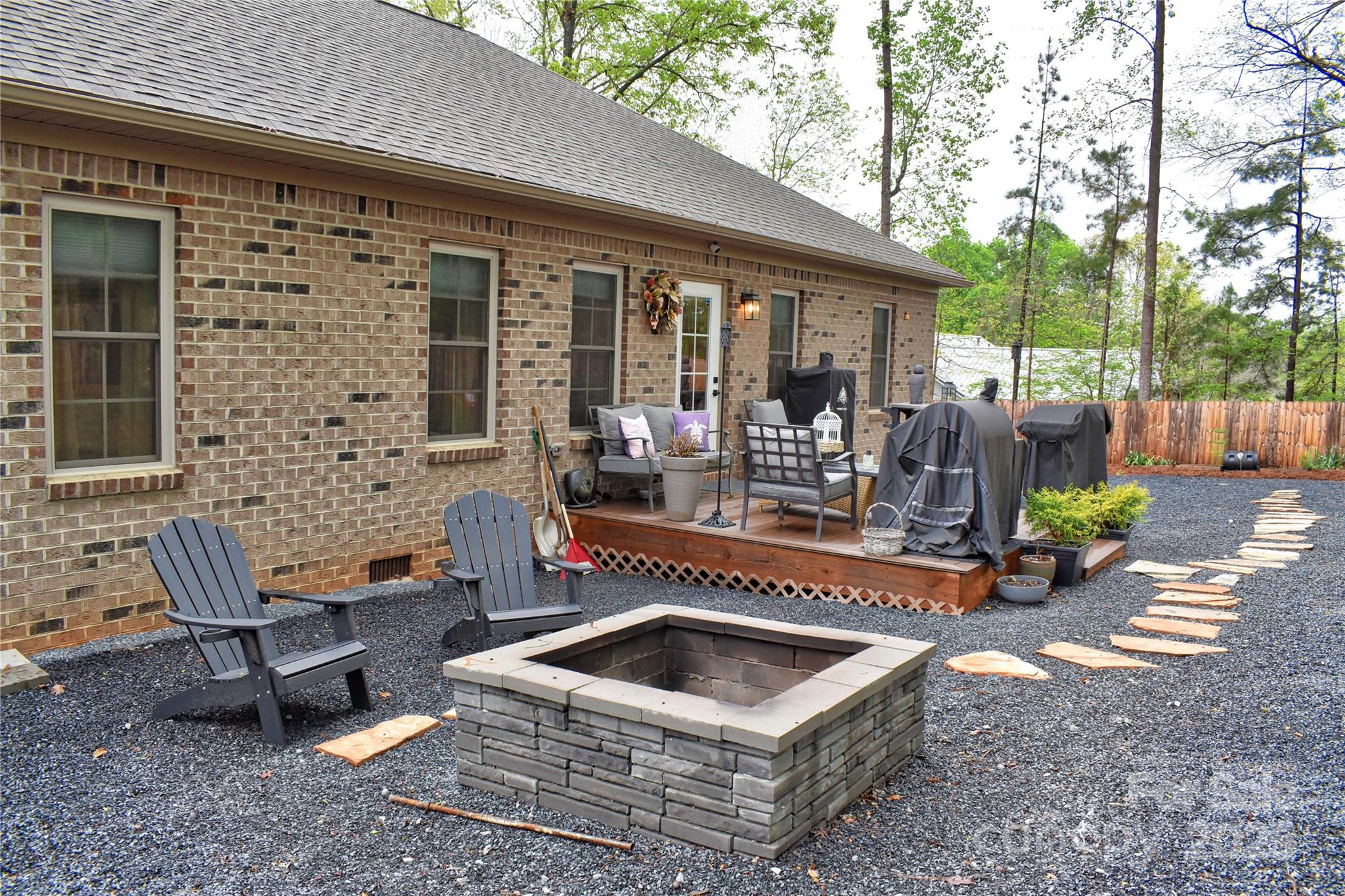 482 Old Camp Road Denton, NC 27239 - Photo 26 of 48 a front view of a house with outdoor seating