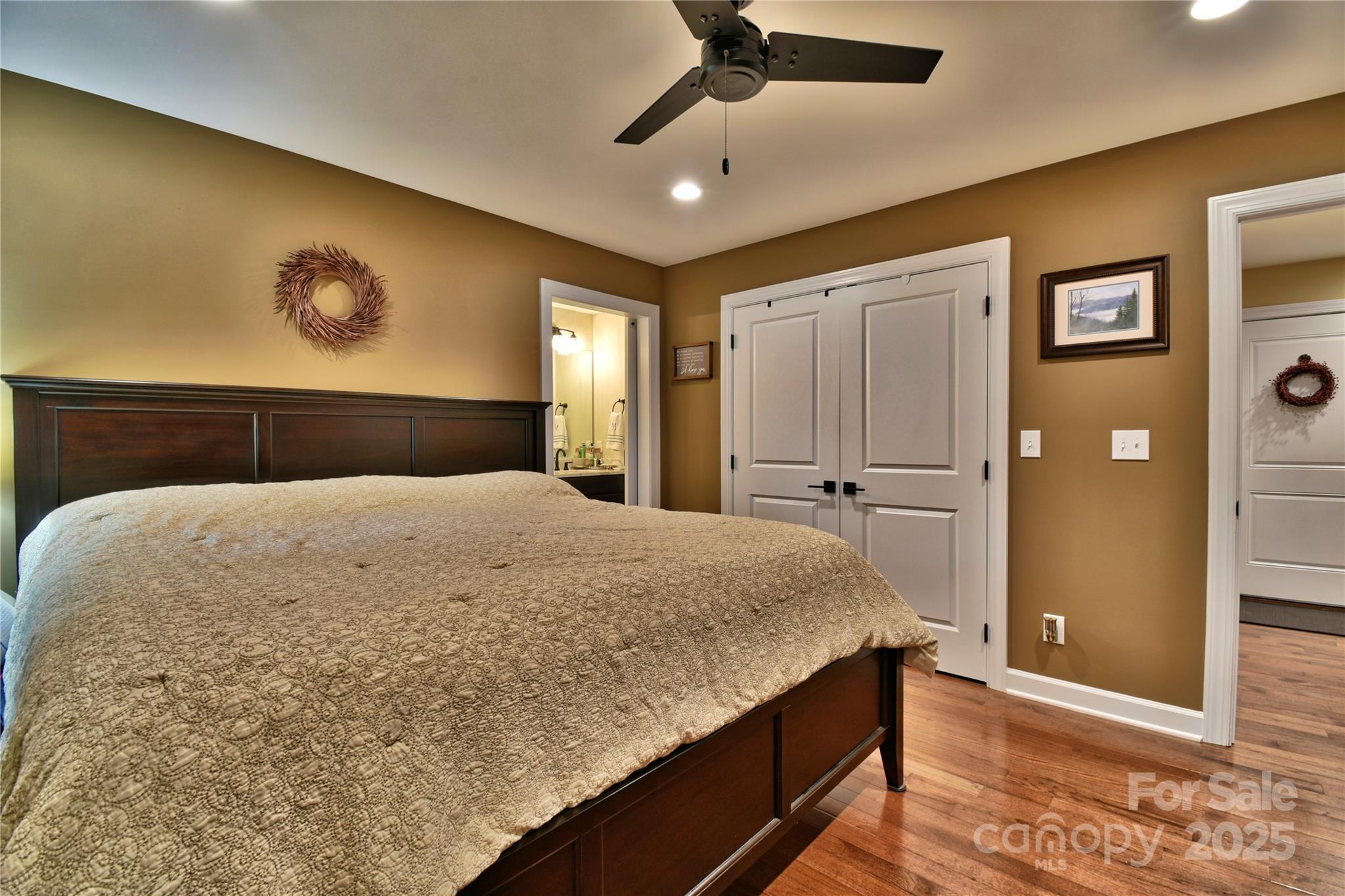 482 Old Camp Road Denton, NC 27239 - Photo 28 of 48 a bedroom with a bed and a walk in closet