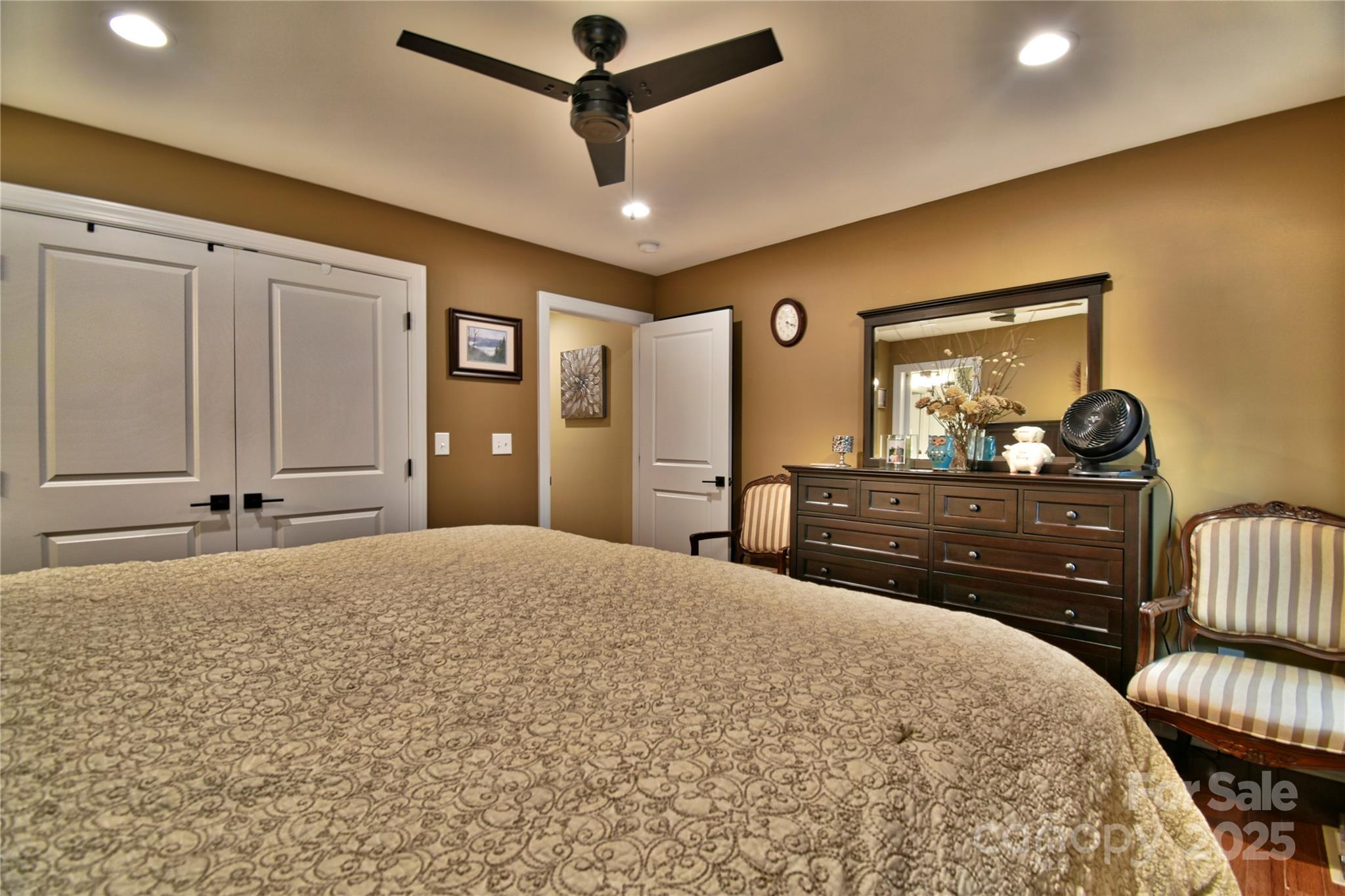 482 Old Camp Road Denton, NC 27239 - Photo 29 of 48 a bedroom with a bed and a dresser