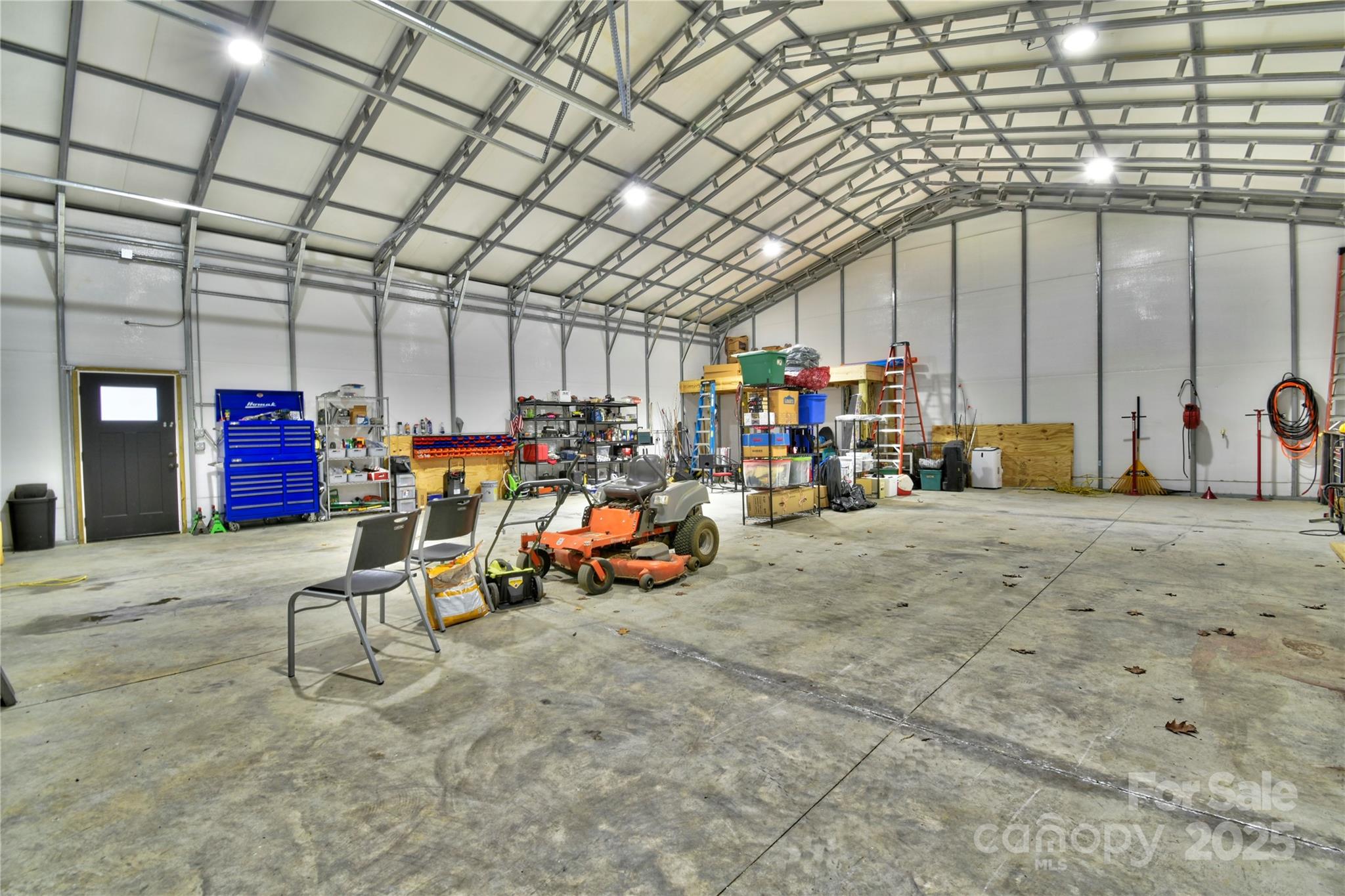 482 Old Camp Road Denton, NC 27239 - Photo 48 of 48 a view of a storage room with gym equipment