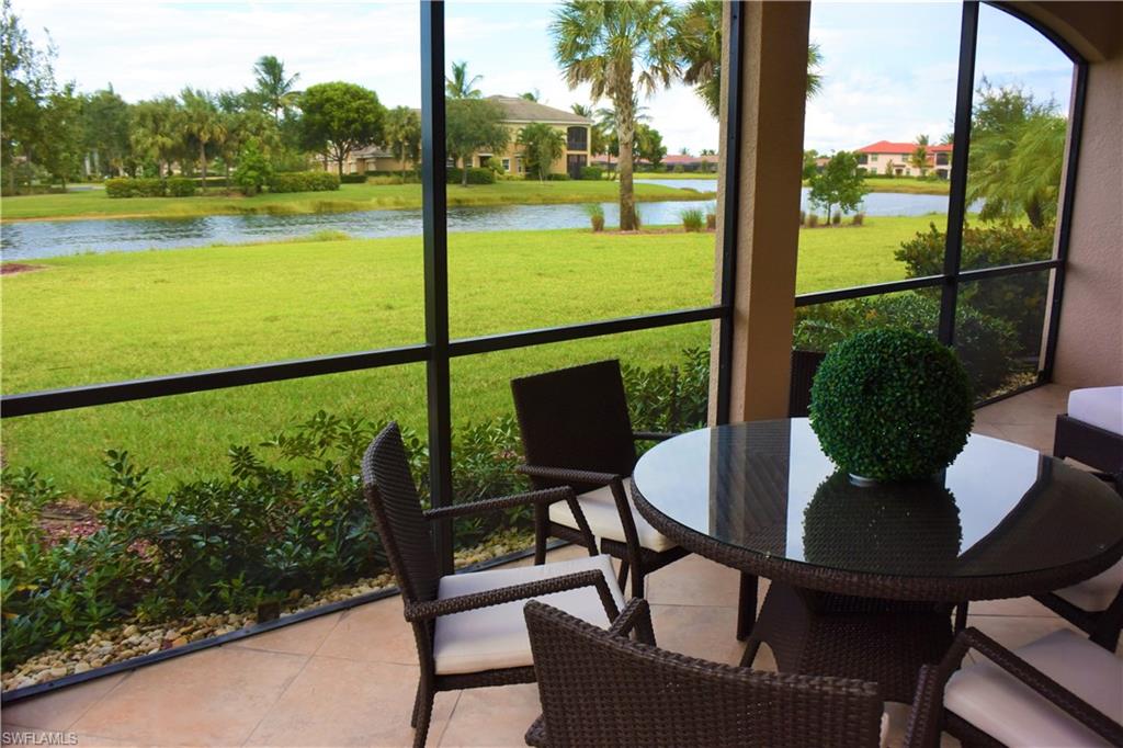 3161 Aviamar Circle, Unit 101 Naples, FL 34114 - Photo 19 of 32 a view of a porch with furniture and garden
