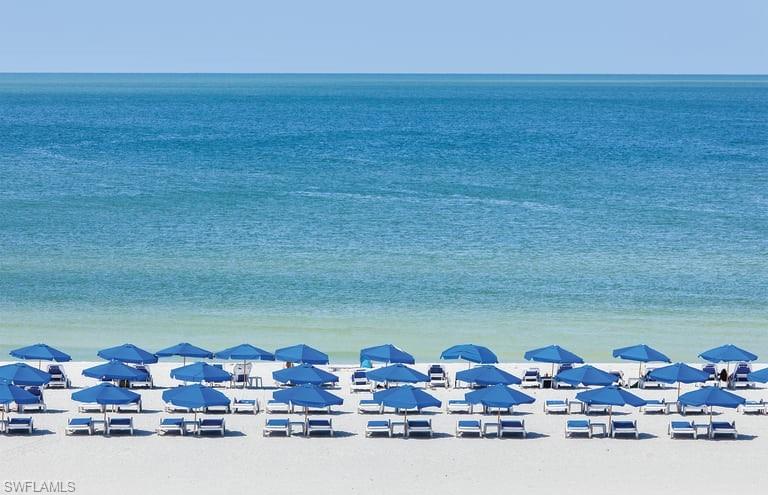 3161 Aviamar Circle, Unit 101 Naples, FL 34114 - Photo 31 of 32 a room with lots of trees and houses