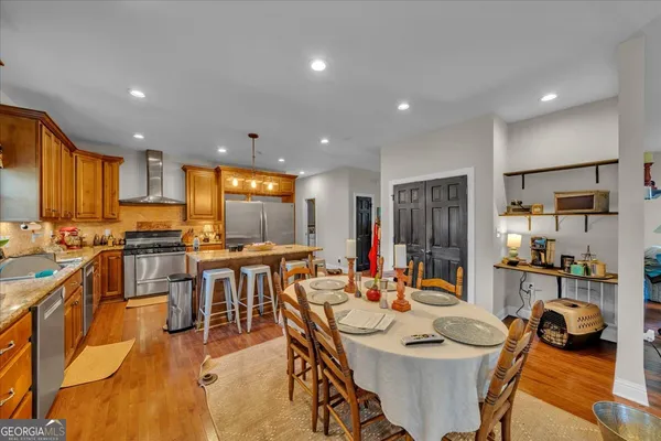 a view of a dining room with furniture