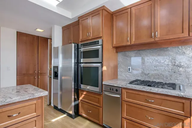 a view of a balcony with wooden floor