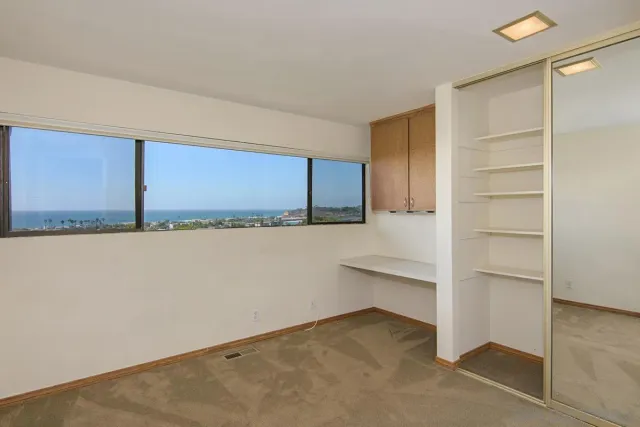 a view of balcony with furniture