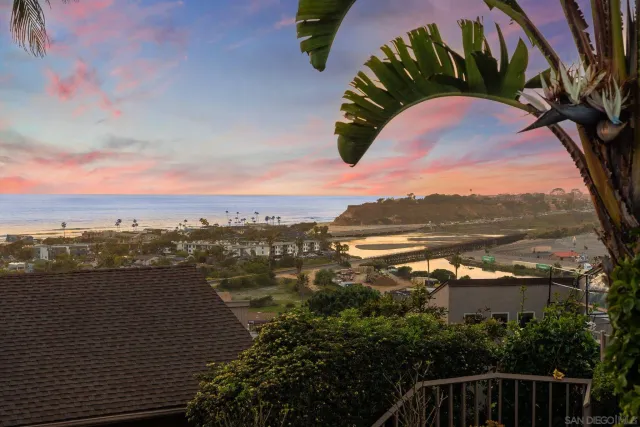 a view of an empty room with a fireplace