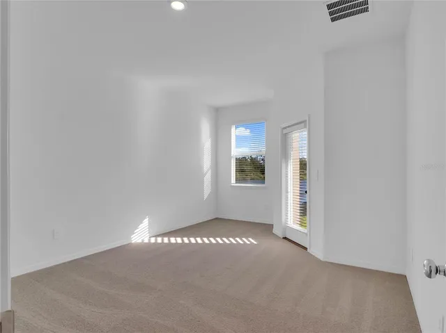 an empty room with windows