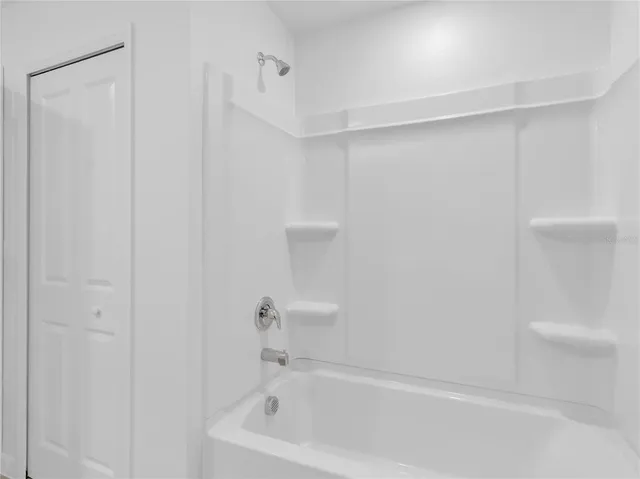 a bathroom with a bathtub