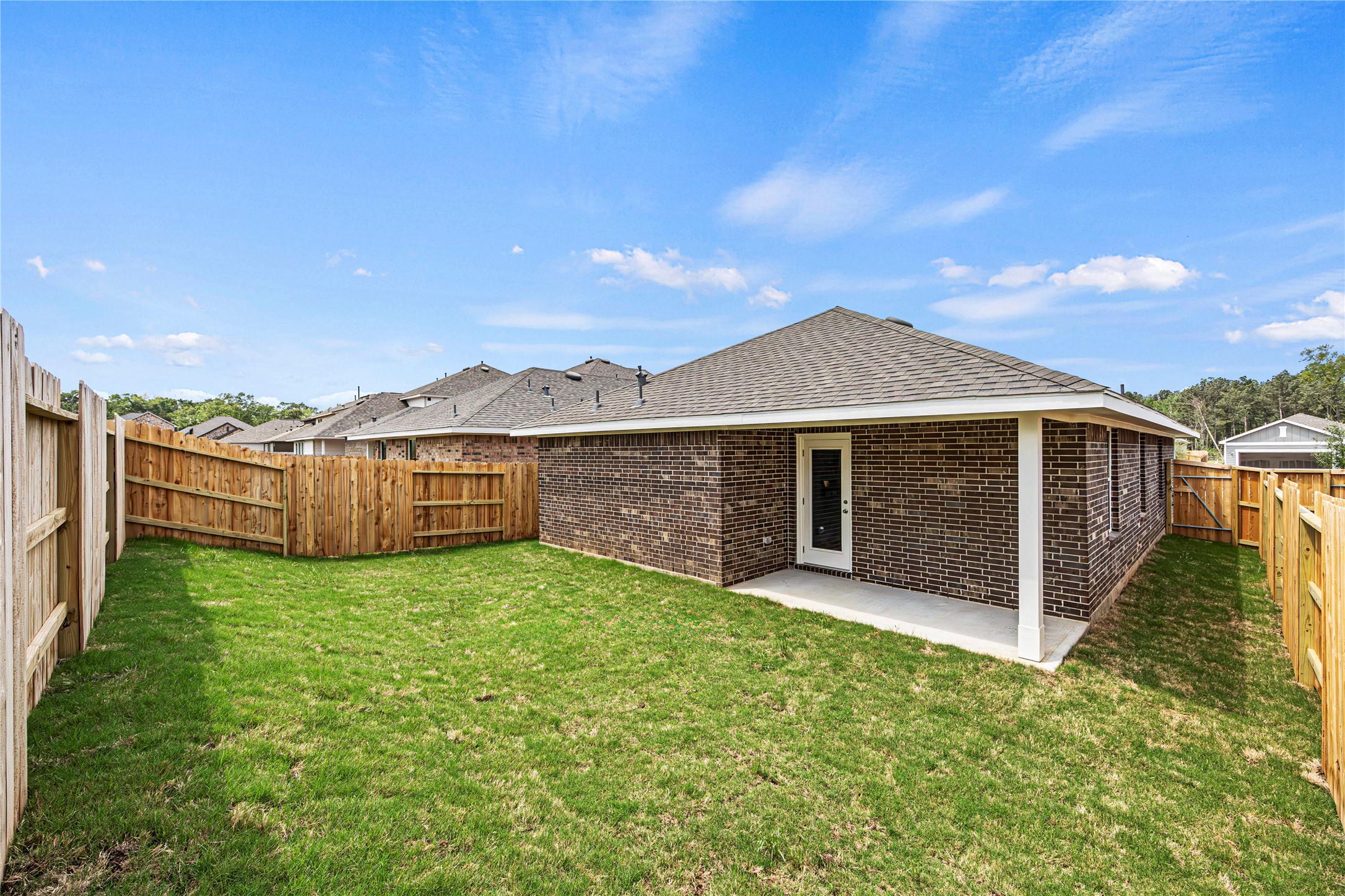 12825 Lime Stone Lane Conroe, TX 77303 - Photo 12 of 12 Backyard & Covered Porch