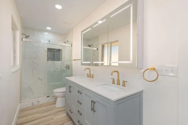 a view of a big room with wooden floor and closet