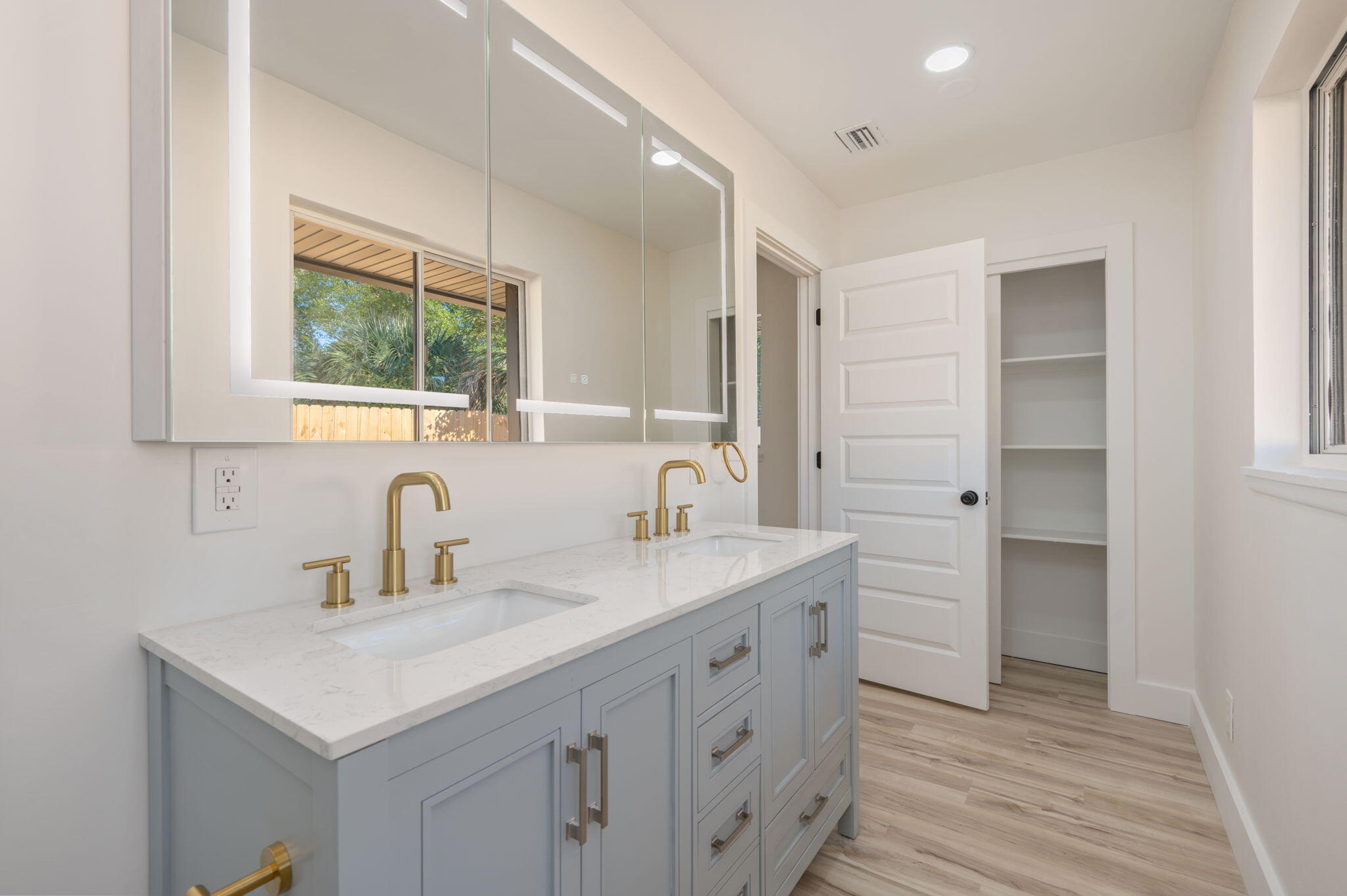 118 Ferry Road Northeast Fort Walton Beach, FL 32548 - Photo 24 of 51 a bathroom with a sink and a mirror