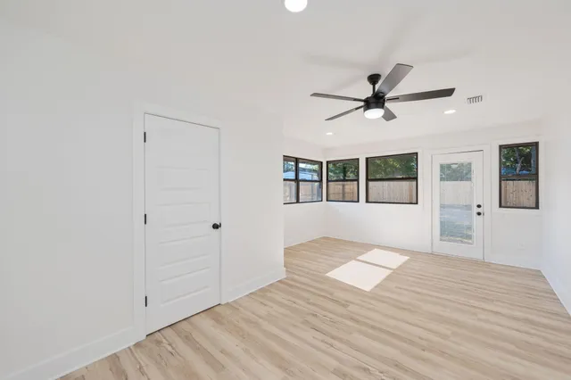 a view of yard covered with trees