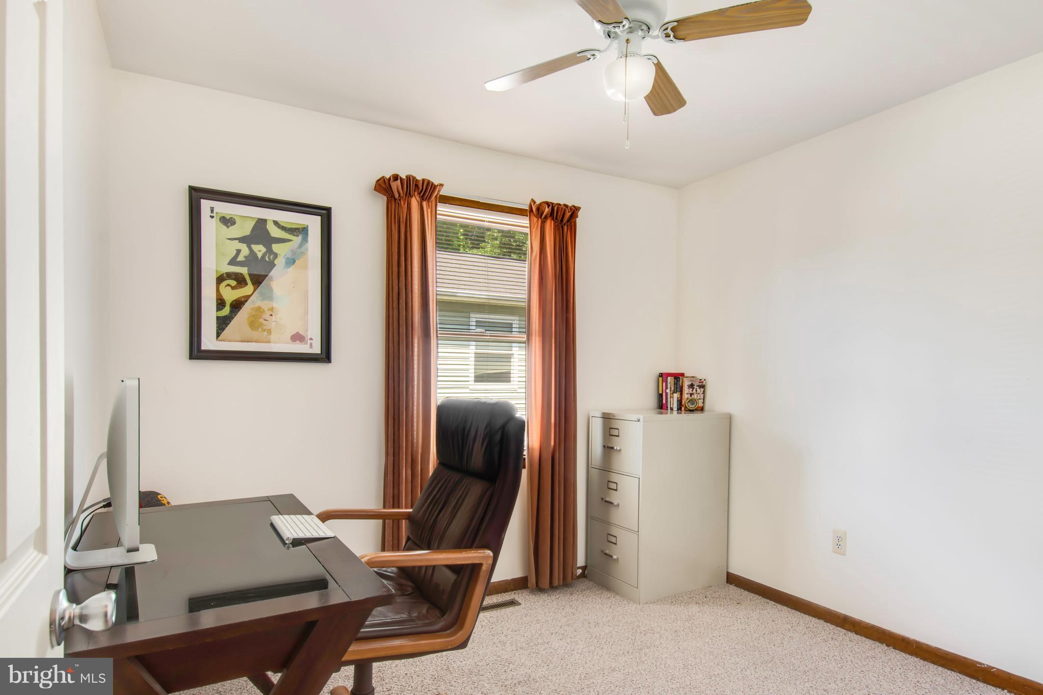 1831 Potomac Road Edgewater, MD 21037 - Photo 14 of 27 a view of a workspace with furniture and a window