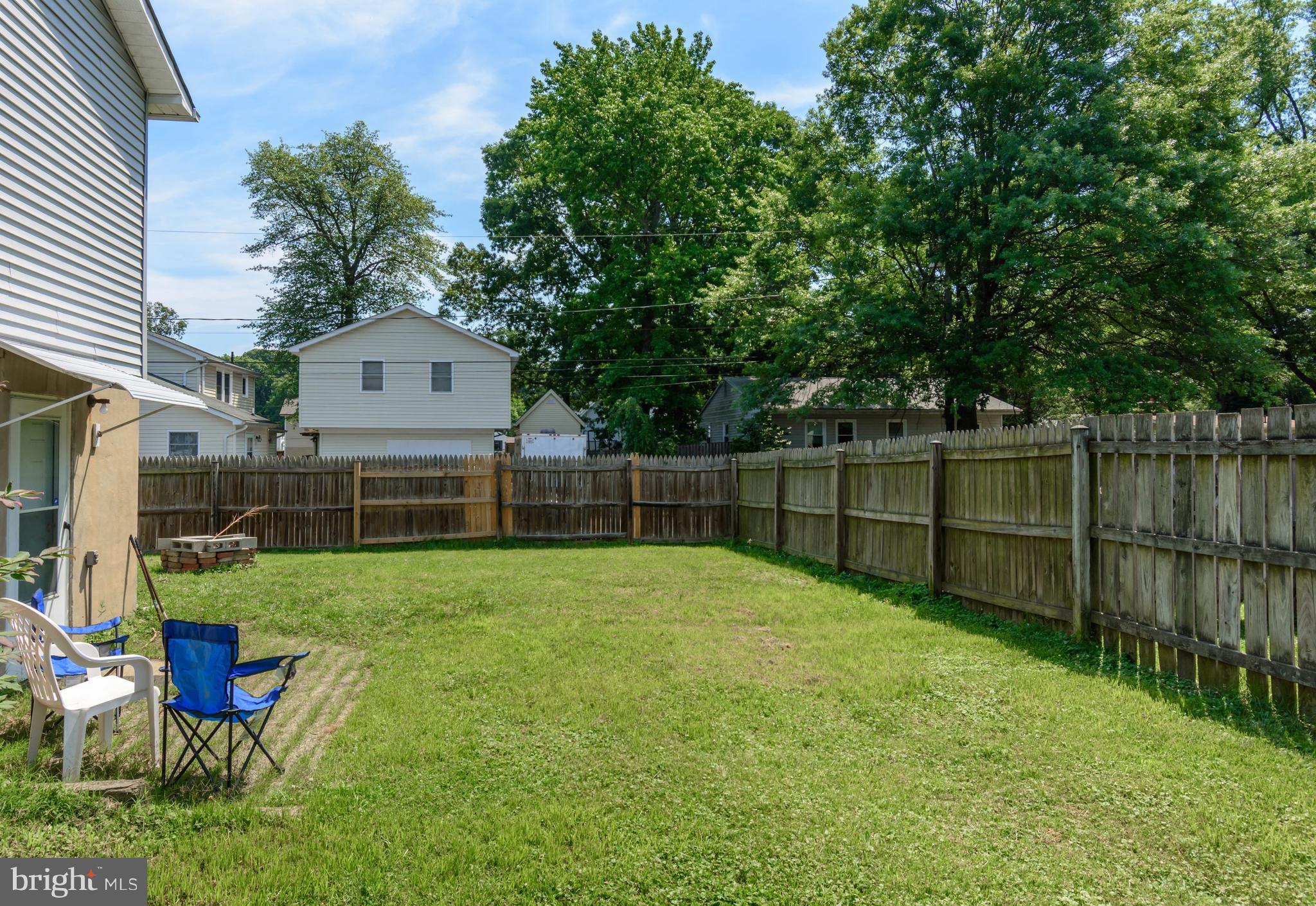 1831 Potomac Road Edgewater, MD 21037 - Photo 21 of 27 a view of a backyard with a garden and entertaining space