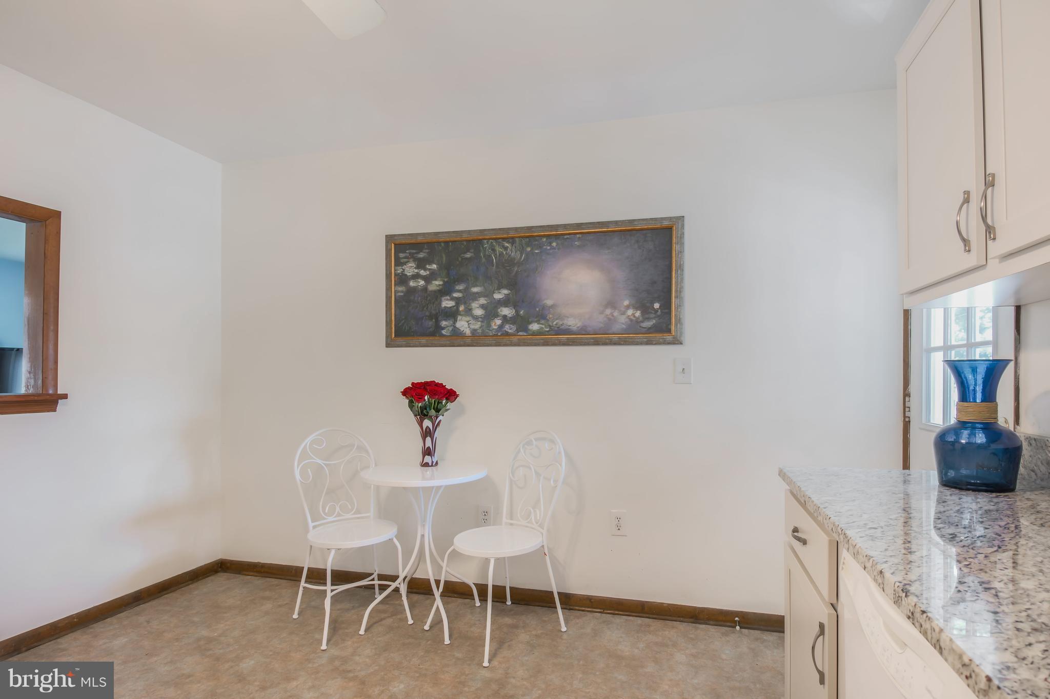 1831 Potomac Road Edgewater, MD 21037 - Photo 6 of 27 a dining room with furniture and window