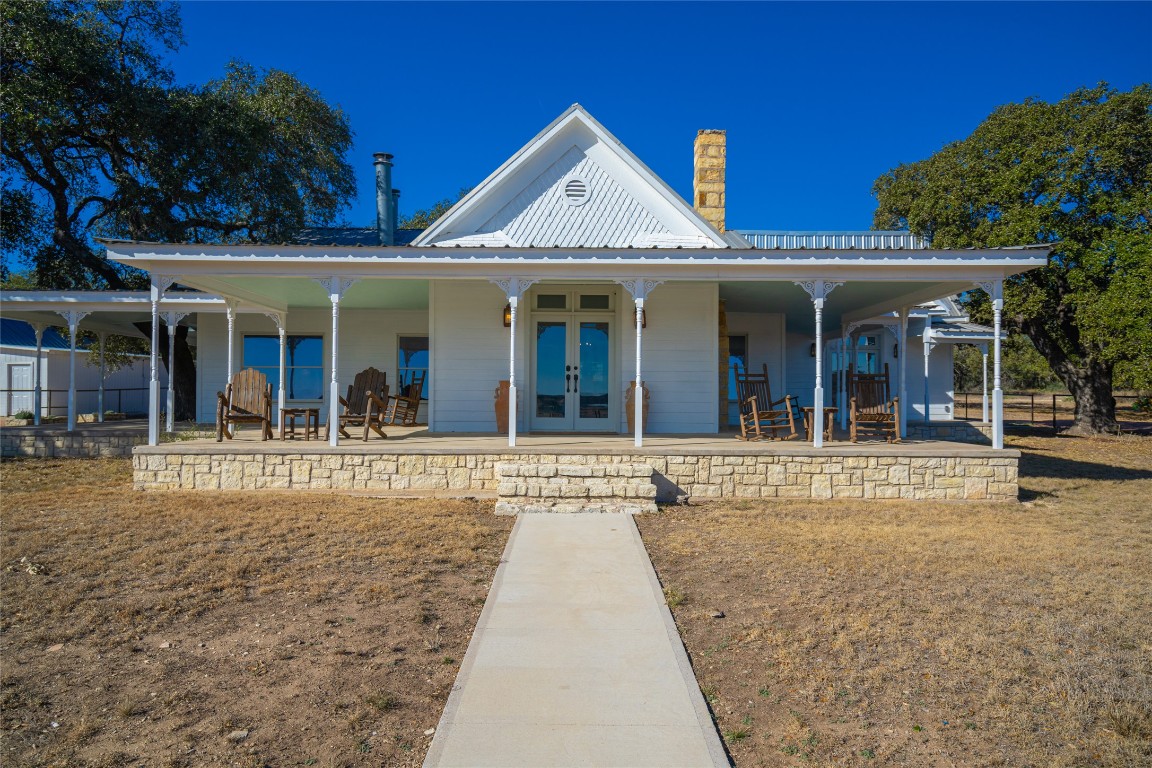 0 County Road 476 Road Rochelle, TX 76872 - Photo 12 of 40 front view of a building with a garden and pathway