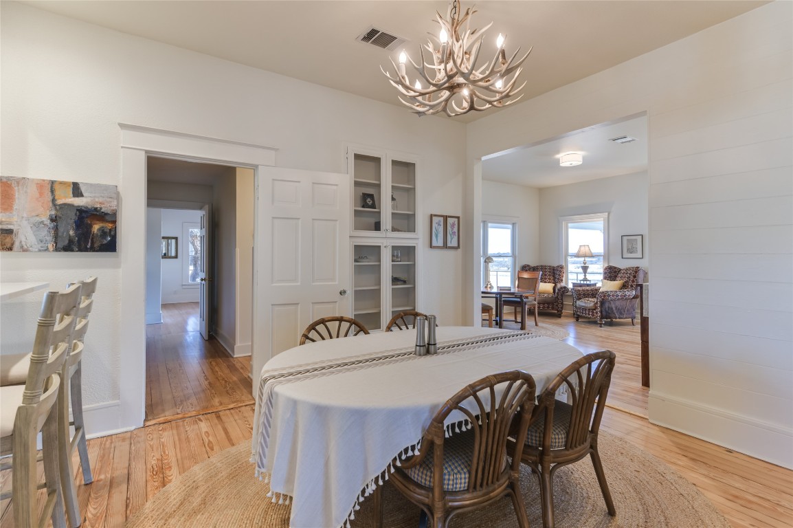 0 County Road 476 Road Rochelle, TX 76872 - Photo 16 of 40 a view of a dining room with furniture and wooden floor