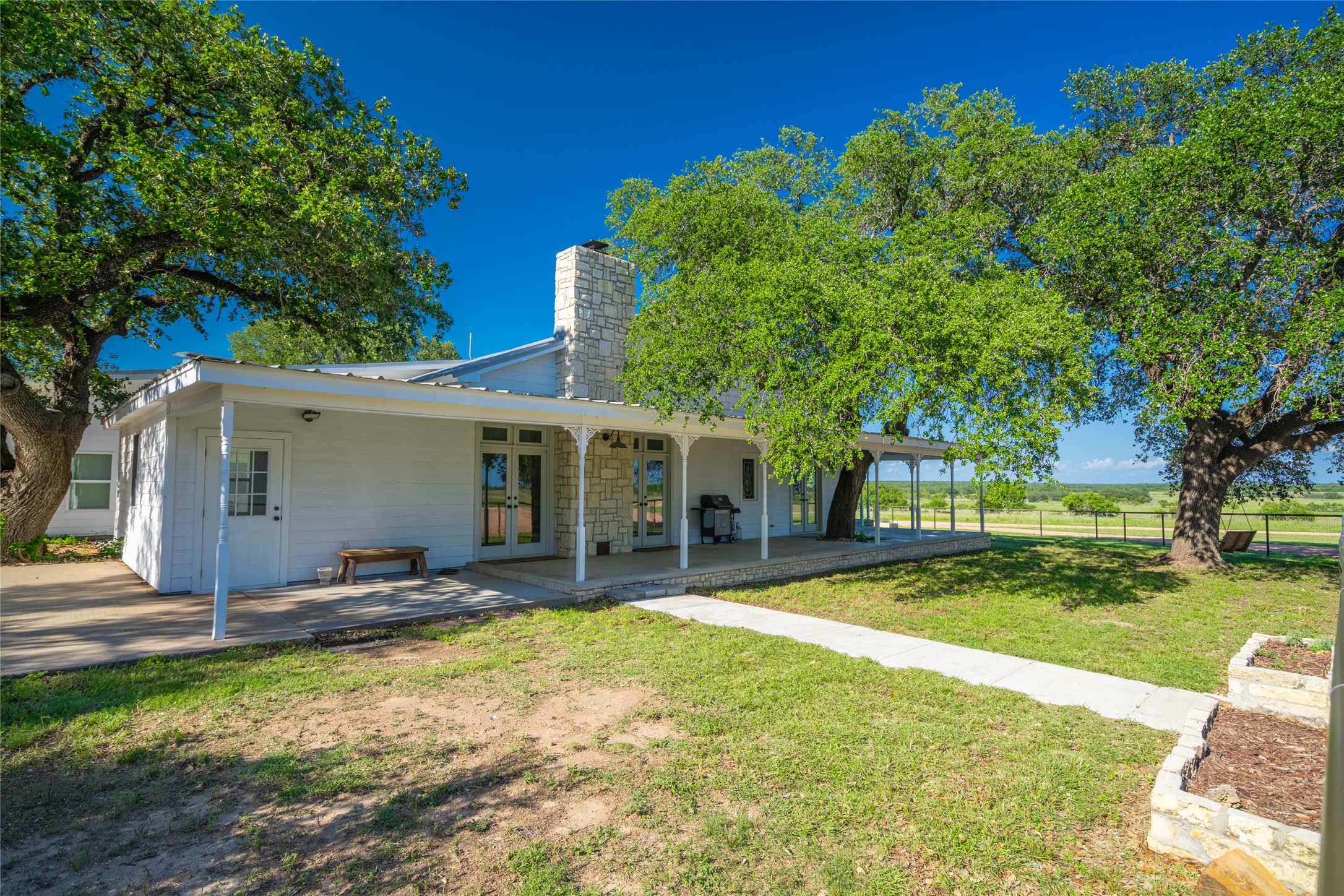 0 County Road 476 Road Rochelle, TX 76872 - Photo 35 of 40 a view of a house with a yard and sitting area