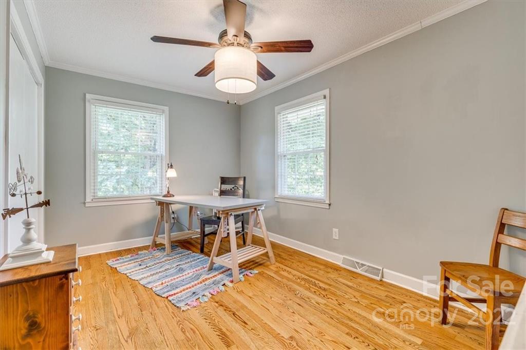 740 North Beersheba Road Clover, SC 29710 - Photo 15 of 46 a workspace with wooden floor and a window