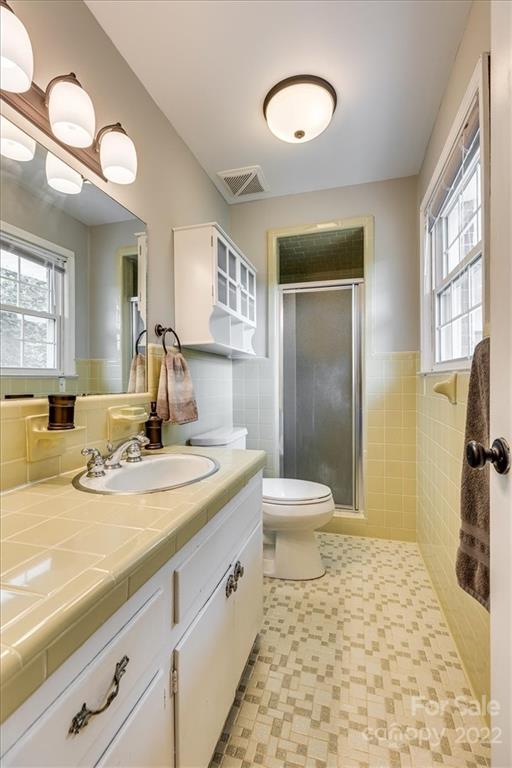 740 North Beersheba Road Clover, SC 29710 - Photo 18 of 46 a bathroom with a granite countertop sink toilet and shower