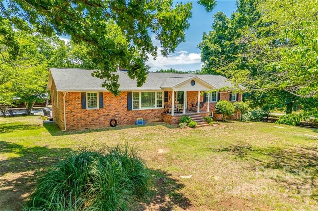 740 North Beersheba Road Clover, SC 29710 - Photo 2 of 46 a front view of a house with yard and green space