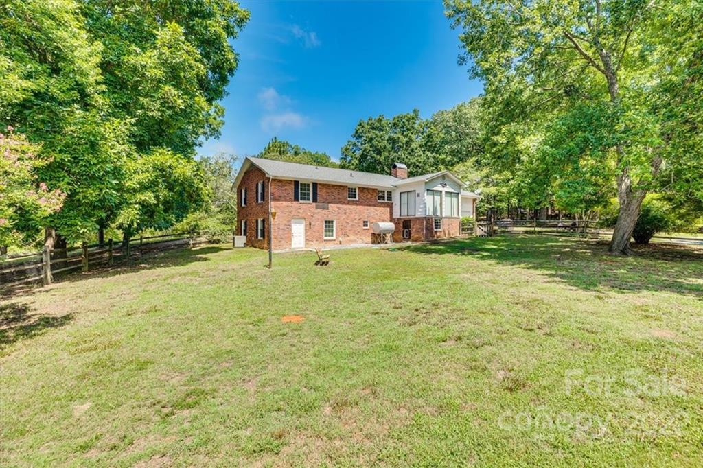 740 North Beersheba Road Clover, SC 29710 - Photo 22 of 46 a view of a house with a yard