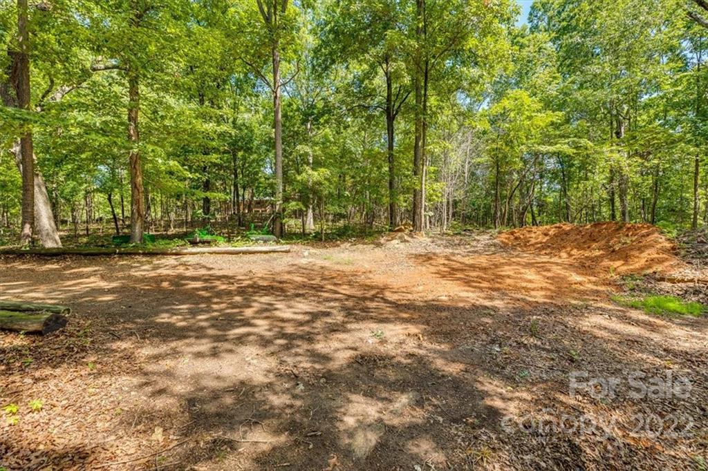 740 North Beersheba Road Clover, SC 29710 - Photo 24 of 46 a view of outdoor space with trees all around