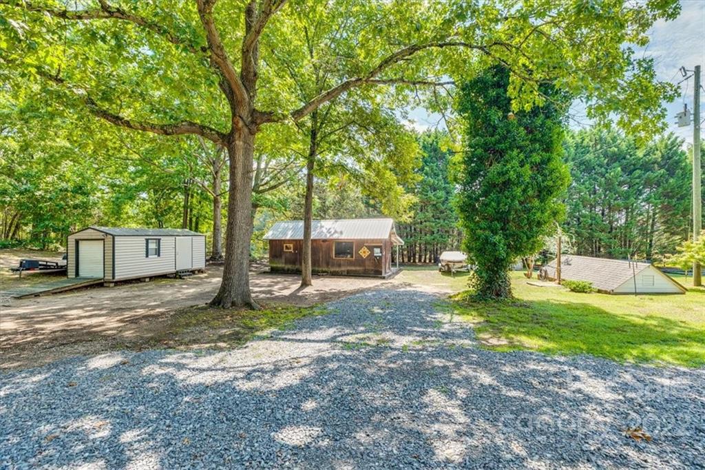 740 North Beersheba Road Clover, SC 29710 - Photo 25 of 46 a view of a outdoor space and garden