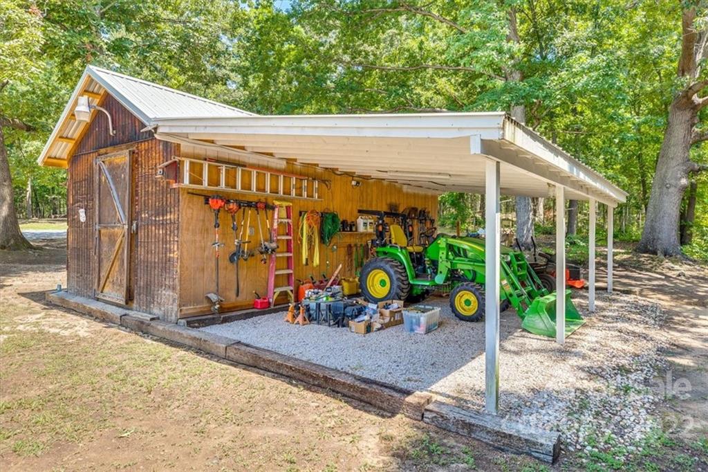 740 North Beersheba Road Clover, SC 29710 - Photo 26 of 46 a view of a house with wooden floor and roof