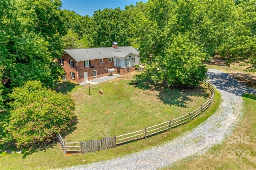 740 North Beersheba Road Clover, SC 29710 - Photo 42 of 46 a view of a house with a backyard