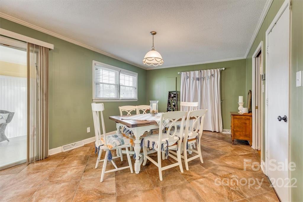 740 North Beersheba Road Clover, SC 29710 - Photo 10 of 46 a view of a dining room with furniture window and wooden floor