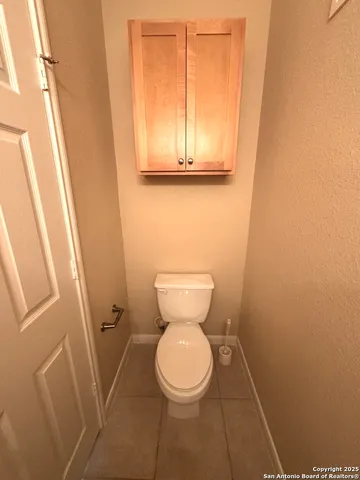 a bathroom with a toilet