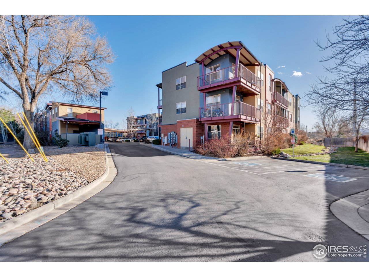 2920 Bluff Street, Unit 212 Boulder, CO 80301 - Photo 15 of 21 a view of a building with car parked