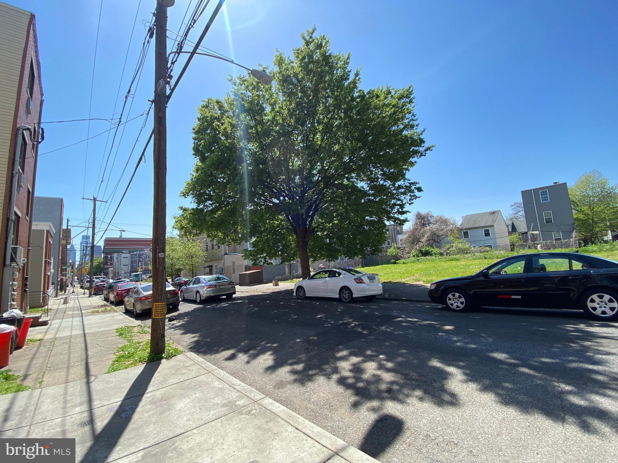 1417 North 17th Street, Unit 2F Philadelphia, PA 19121 - Photo 10 of 11 a view of a street with cars park