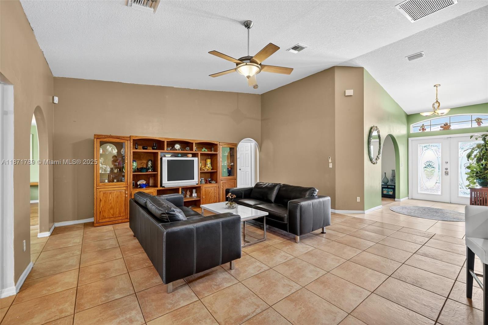 1019 Southwest California Boulevard Port St. Lucie, FL 34953 - Photo 13 of 40 a living room with furniture