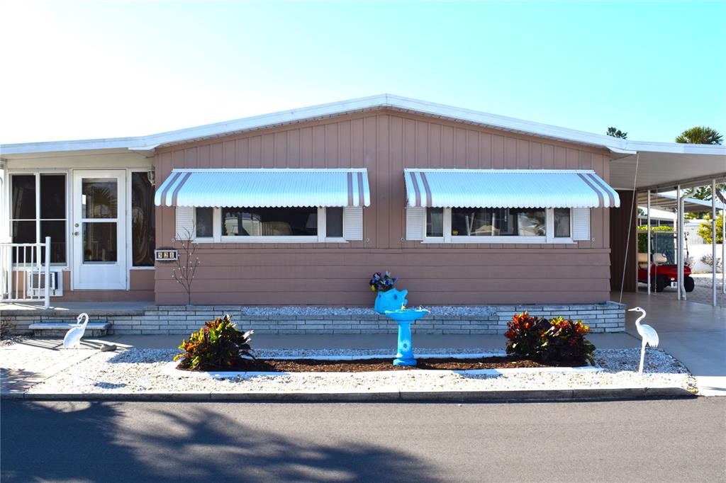 521 Roma Road Venice, FL 34285 - Photo 35 of 57 a front view of a house with porch