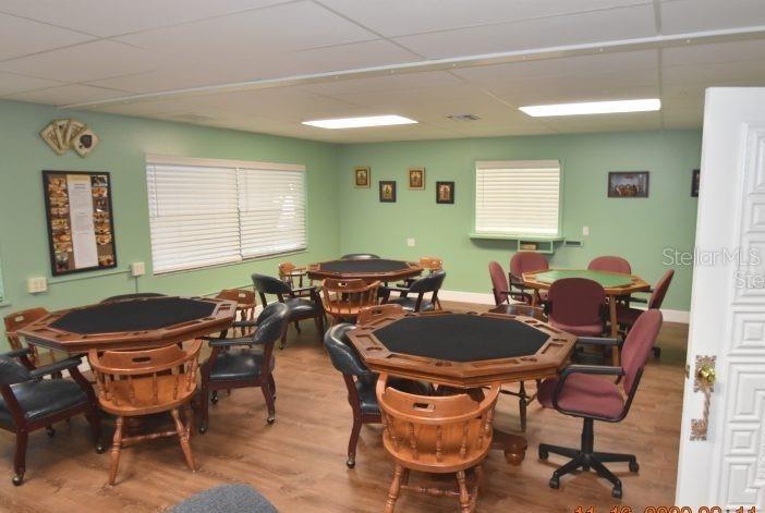 521 Roma Road Venice, FL 34285 - Photo 55 of 57 a view of a dining room with furniture and window