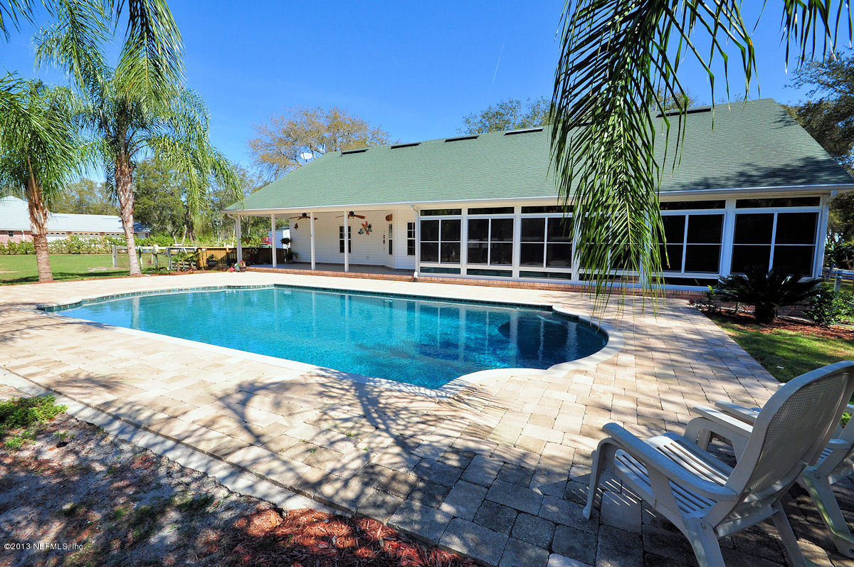 16024 Shellcracker Road Jacksonville, FL 32226 - Photo 12 of 26 a view of a house with swimming pool