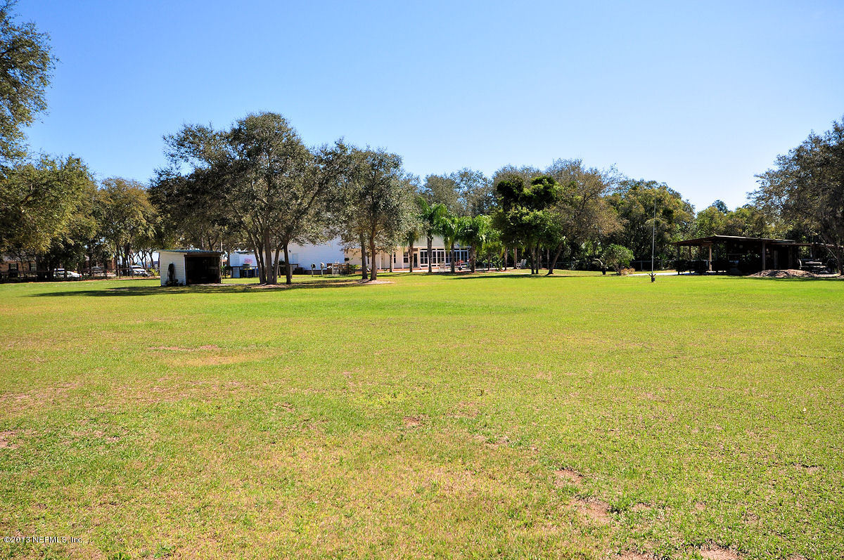 16024 Shellcracker Road Jacksonville, FL 32226 - Photo 20 of 26 a view of an ocean with a building in the background