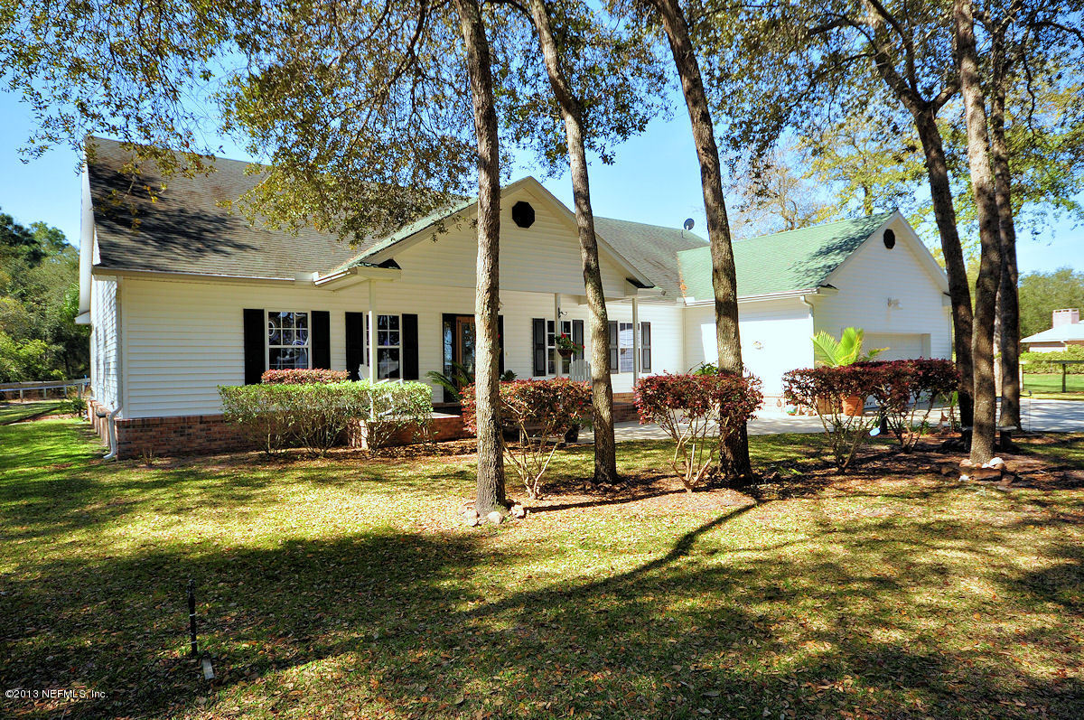 16024 Shellcracker Road Jacksonville, FL 32226 - Photo 2 of 26 a view of a house with backyard and sitting area
