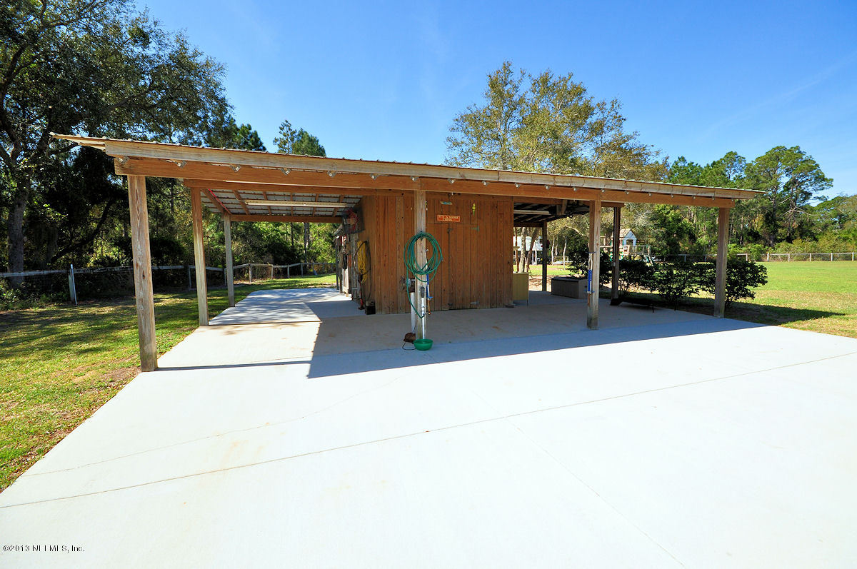 16024 Shellcracker Road Jacksonville, FL 32226 - Photo 23 of 26 front view of a house with a porch