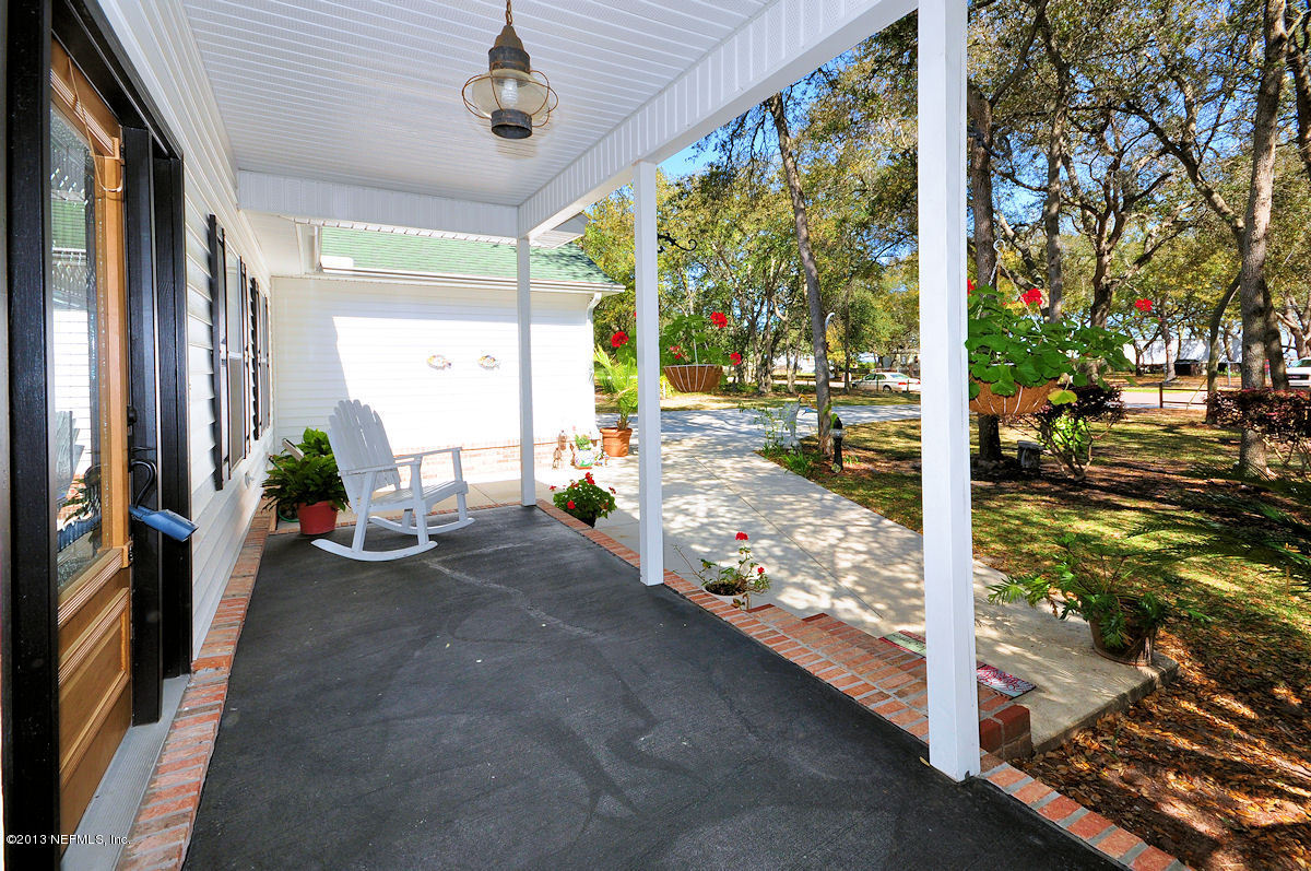16024 Shellcracker Road Jacksonville, FL 32226 - Photo 3 of 26 a view of a porch with seating space