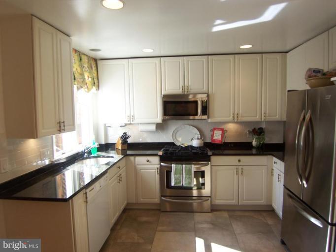 4448 Reservoir Road Northwest Washington, DC 20007 - Photo 2 of 16 Classic White Kit. w/quality appliances/granite