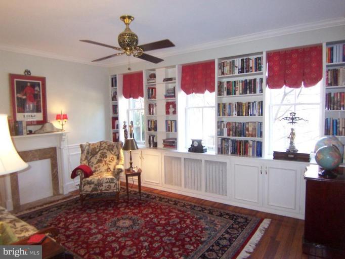 4448 Reservoir Road Northwest Washington, DC 20007 - Photo 6 of 16 Historic Room w/period fireplace piece & built-ins