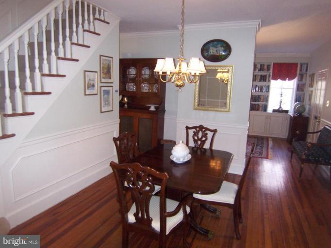 4448 Reservoir Road Northwest Washington, DC 20007 - Photo 7 of 16 Original staircase & antique china cabinet