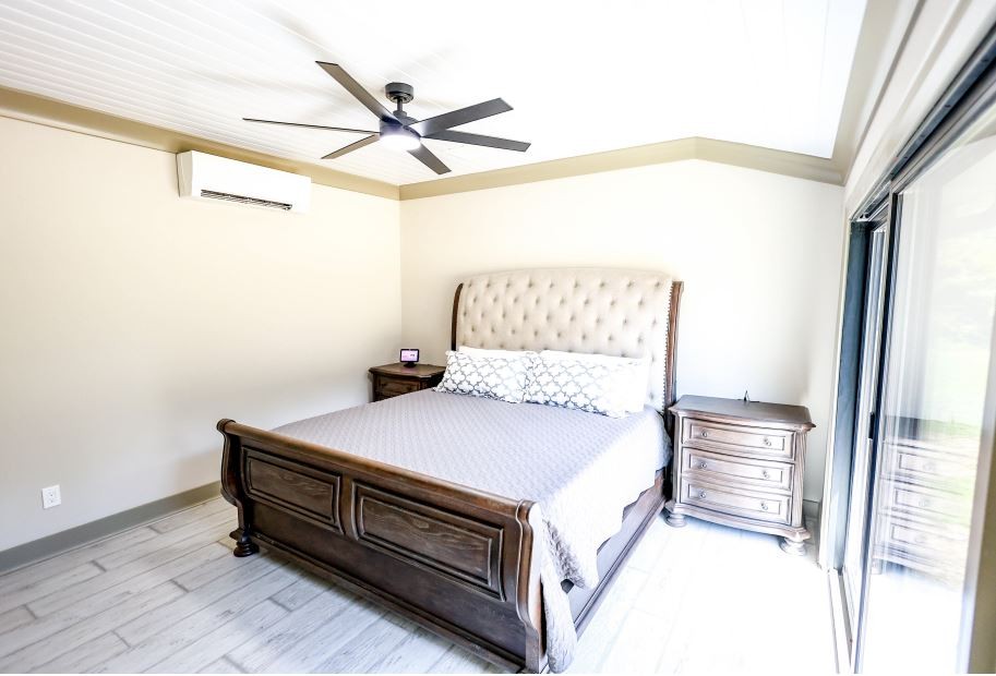 2025 Nelson Lane Murfreesboro, TN 37129 - Photo 13 of 35 a bedroom with a bed and a ceiling fan