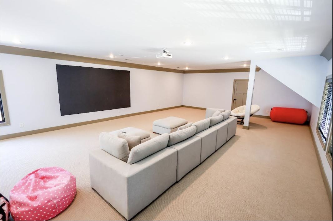 2025 Nelson Lane Murfreesboro, TN 37129 - Photo 21 of 35 a living room with furniture and a flat screen tv