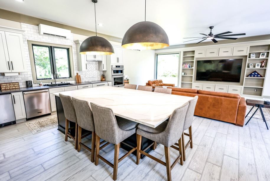 2025 Nelson Lane Murfreesboro, TN 37129 - Photo 4 of 35 a dining hall with stainless steel appliances granite countertop a stove a kitchen island a dining table and chairs
