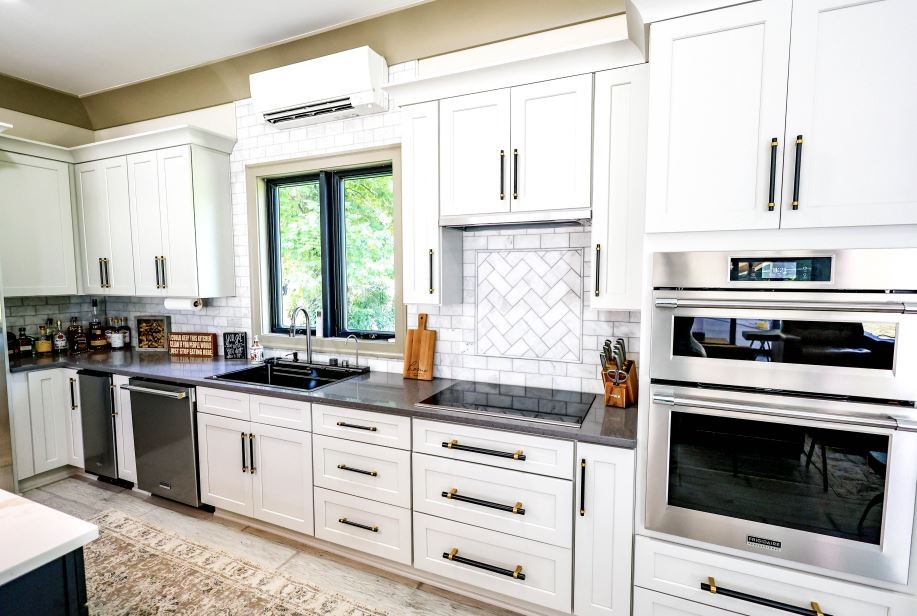 2025 Nelson Lane Murfreesboro, TN 37129 - Photo 6 of 35 a kitchen with granite countertop white cabinets stainless steel appliances and a window