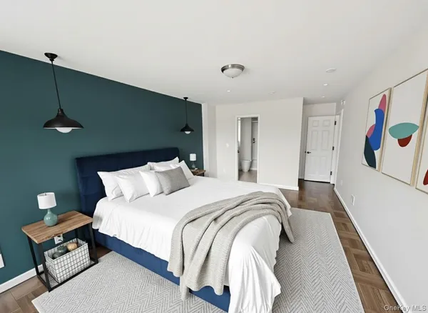 a bathroom with a toilet a sink and a mirror